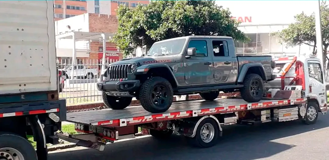 Transporte de vehículos con seguro de póliza y eficiencia